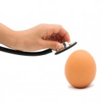 Checking For A Healthy Egg, Egg with Stethoscope with white background